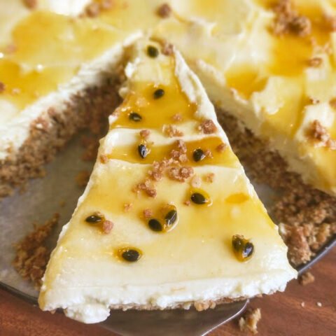 Passion fruit syrup served on cheesecake.