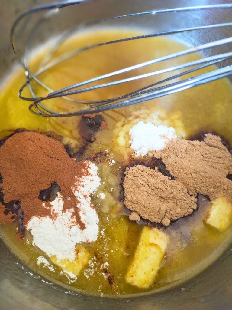 melted butter with spices and other ingredients in a pot