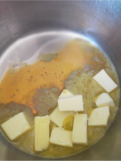 Chunks of butter melting in a pot