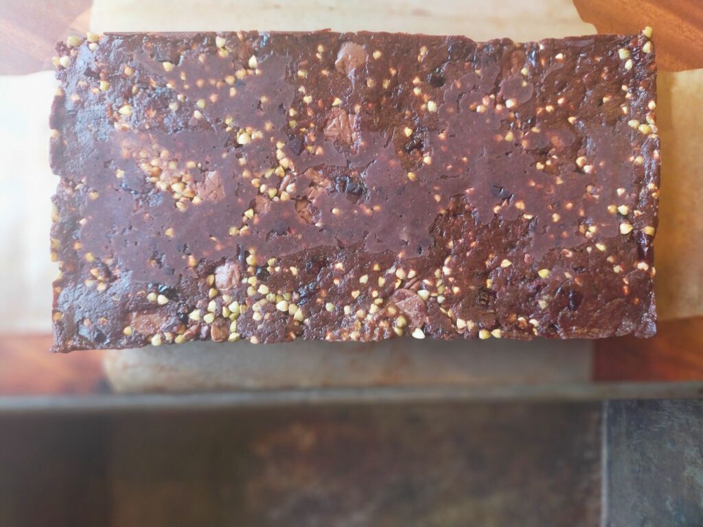 Slab of no bake energy bar after being removed from the tin,