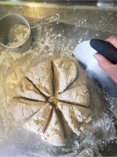 Cutting corn free tortilla dough into eight sections